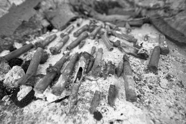 istock Rusty fragments, bullets in a dugout 1221639242