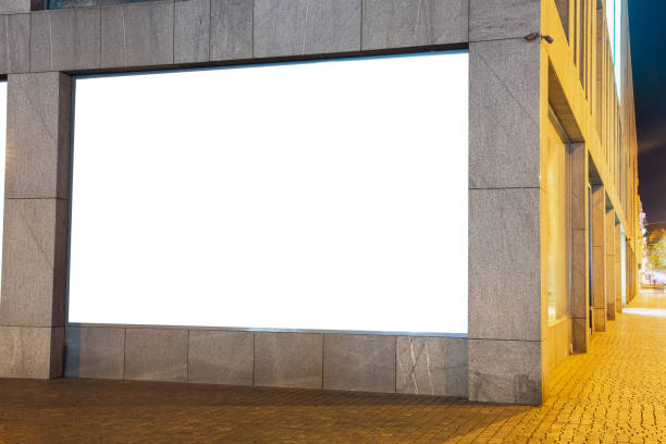 istock Blank citylight for advertising on the building at city night, copyspace for your text, image, design 1221640730