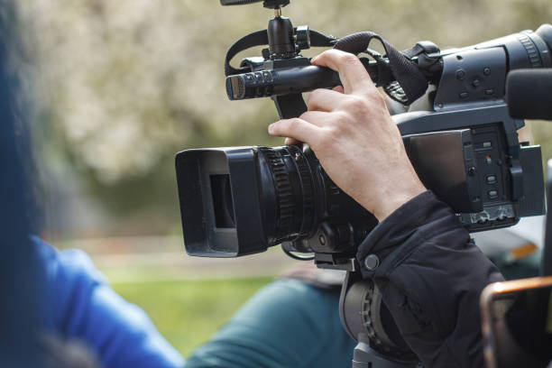 istock outdoor camera, when shooting a report 1221642042