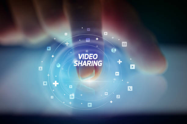 istock Finger touching tablet with social media icons concept 1221642786
