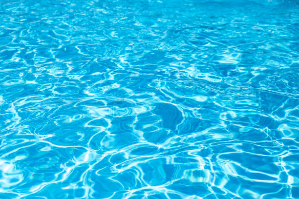 istock swimming pool with ripple turquoise 1221642879