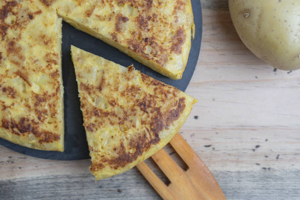istock Portion of homemade potato omelette with onion 1221642949