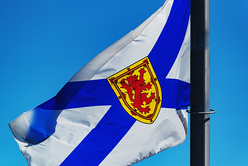 Nova Scotian flag at half mast.