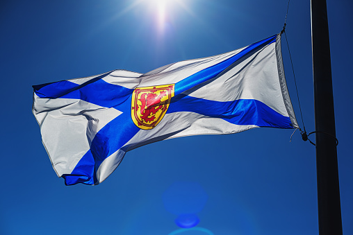 Nova Scotian flag at half mast.