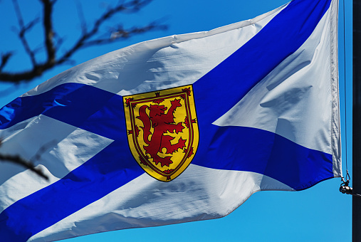 Nova Scotian flag at half mast.