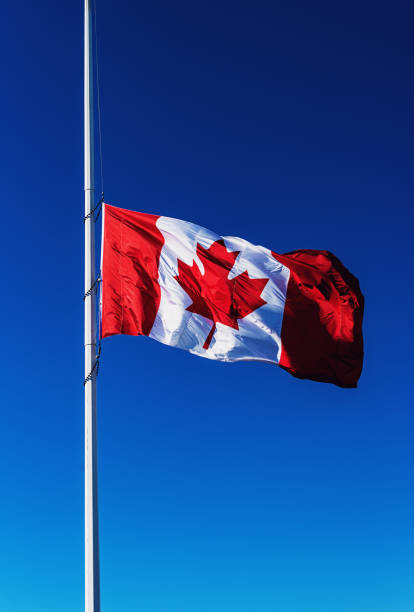 istock Canadian Flag at Half Mast 1221643155