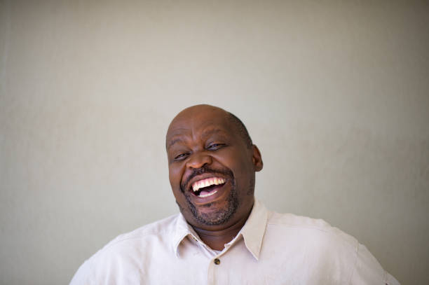 istock Senior African Male portrait laughing sideways 1221644483