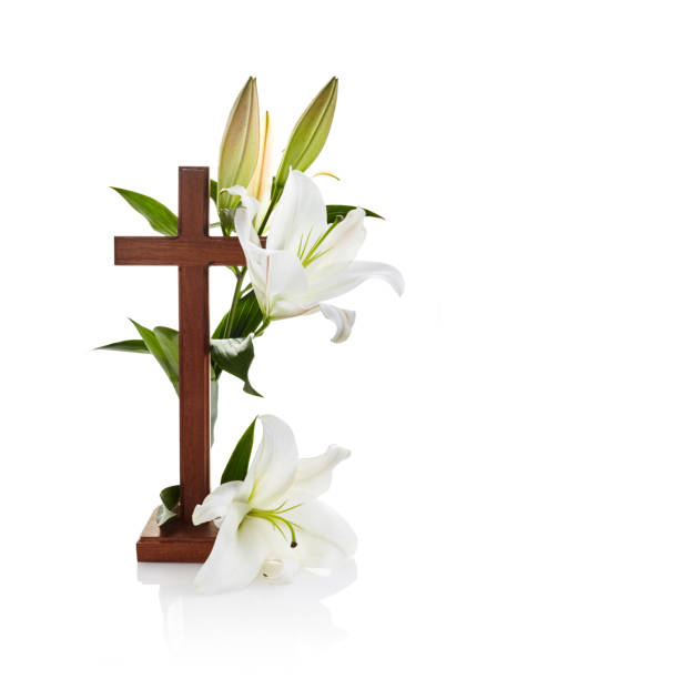istock Cross with lilies isolated on white background for decorative design. Spring background. Easter card. 1221646716
