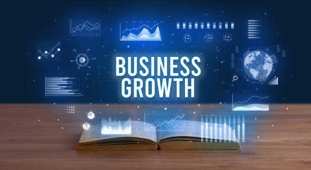 istock Business inscription coming out from an open book 1221648521