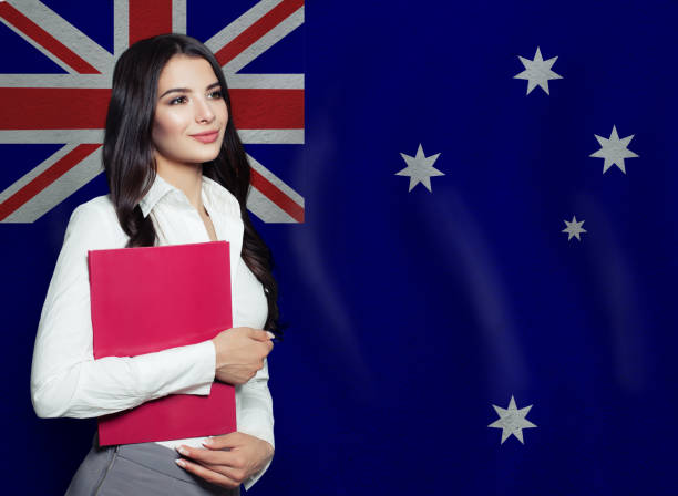 istock Young woman with red book. Learn or business concept 1221653052