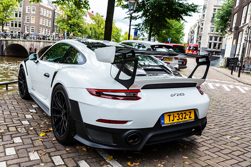 Amsterdam, Netherlands - September 8, 2018: White Porsche 911 GT2 RS car parked on a street in Amsterdam, Holland