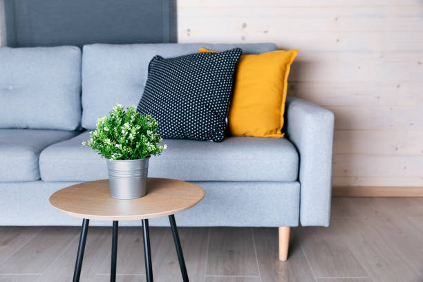 istock Beautiful living room interior with sofa and colorful pillows 1221655920