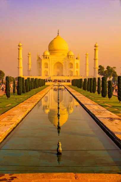 The Taj Mahal is an ivory-white marble mausoleum on the south bank of the Yamuna river in the Indian city of Agra, Uttar Pradesh.