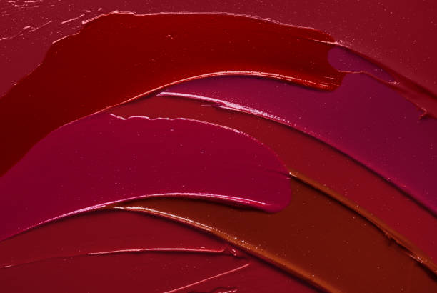 istock Vibrant red purple pink textured tint or lipstick 1221661695