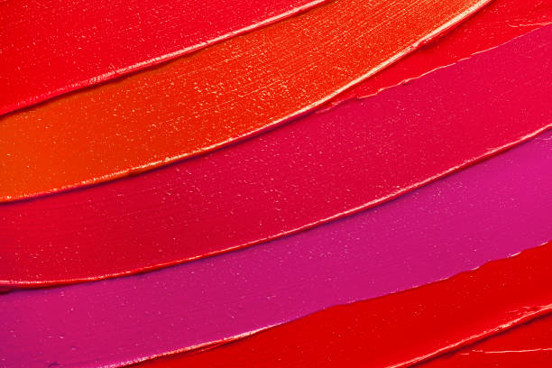 istock Vibrant red purple pink textured tint or lipstick 1221661842