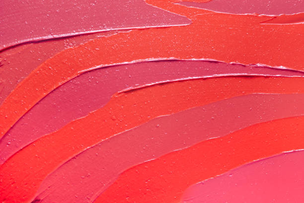 istock Vibrant red purple pink textured tint or lipstick 1221661884