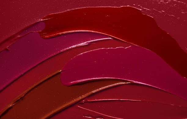 istock Vibrant red purple pink textured tint or lipstick 1221663291