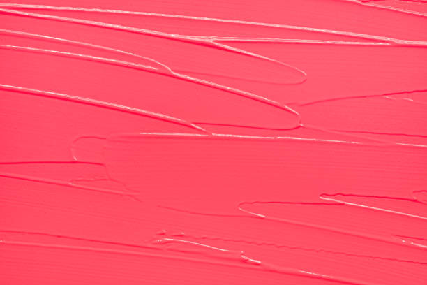 istock Vibrant red purple pink textured tint or lipstick 1221663528