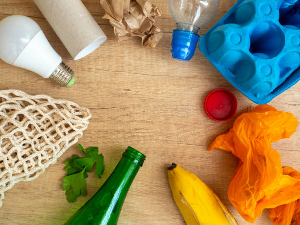 istock Different garbage on wooden background, top view. Reuse, reduce, recycle concept 1221663981