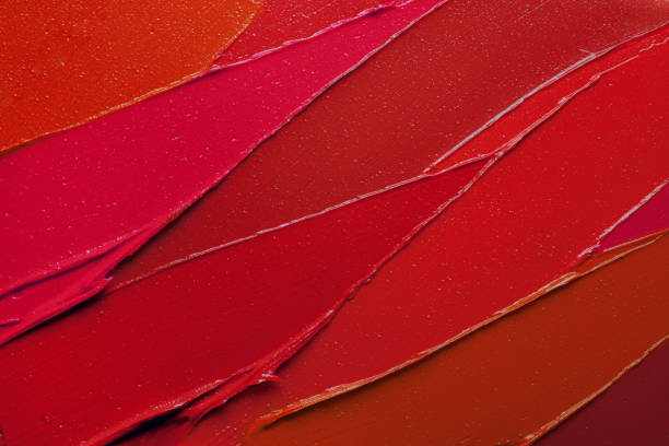 istock Vibrant red purple pink textured tint or lipstick 1221667819
