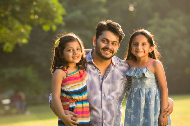 istock Father With Daughters - stock Images 1221668794