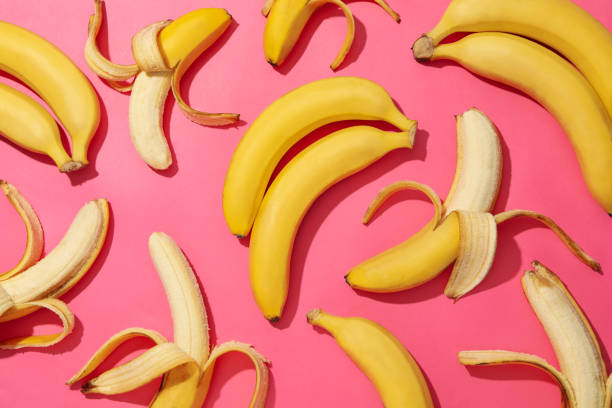 istock Bananas and apples on white background, top view. Fresh fruit 1221674032