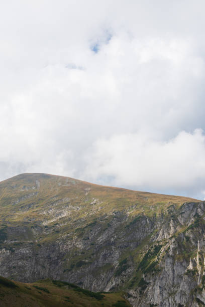 istock Rocky mountains and beautiful sky. Place for text 1221675283