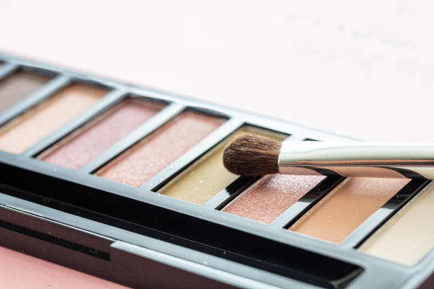 istock Eyeshadow pallete kit against pink background, copy space 1221677102