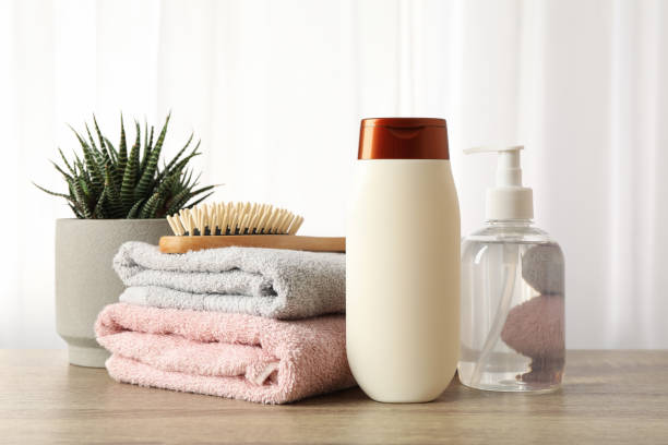 istock Composition with hair care products on wood table 1221677146