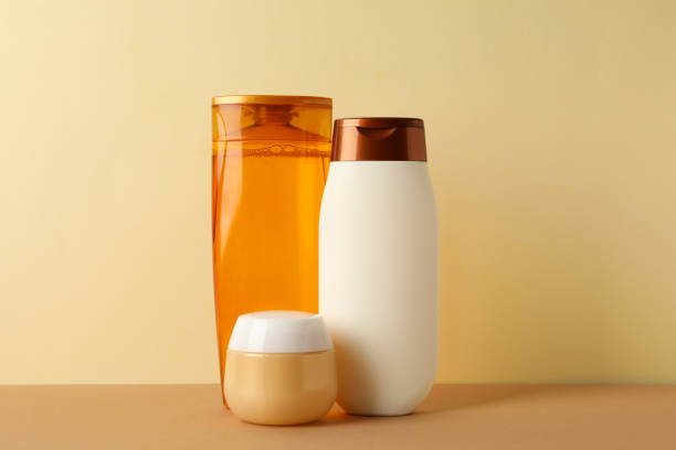 istock Blank cosmetic bottles on beige background, space for text 1221678230