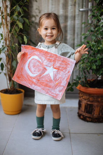 istock Little Girl With Turkish Flags 1221679555