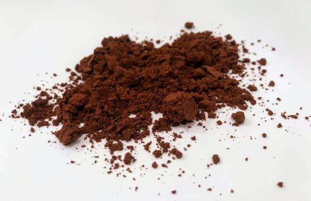 istock A pile of powdered, ground coffee on a white background 1221680005