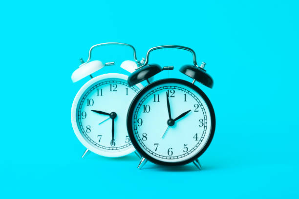 istock Time background concept. Vintage classic alarm clock on blue empty background. Time management comcept 1221680884