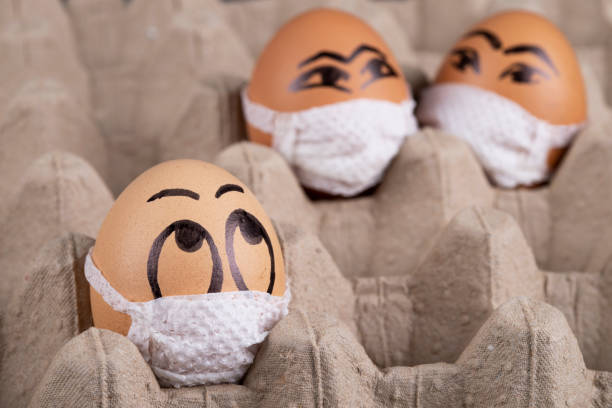 istock Eggs  wearing medical masks 1221683490