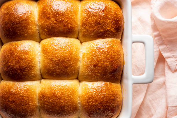istock Bread buns home-baked in a ceramic tray. 1221684724