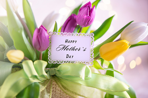 Mother`s Day Greeting Card on a Flower Arrangement