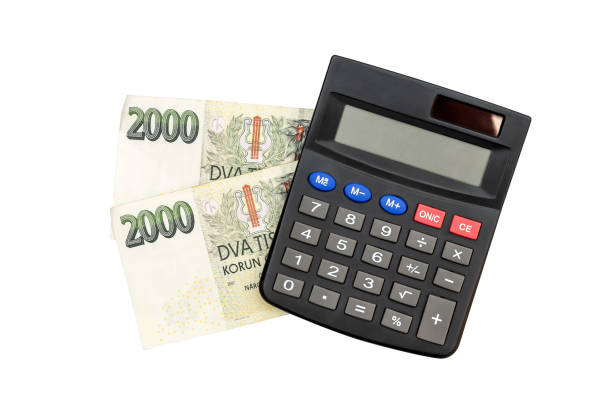 istock Czech krona bills with calculator on white. 1221686406
