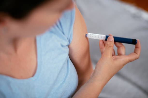 istock Injection with insulin pen stock photo 1221686879