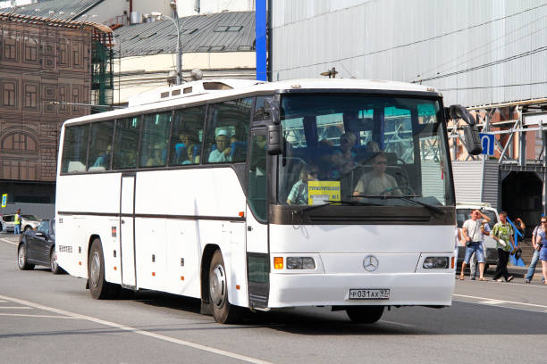 Moscow, Russia - July 7, 2012: White touristic coach bus Mercedes-Benz Turk O304 in the city street.
