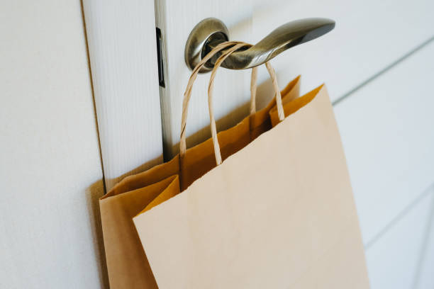 istock The craft package hangs on the handle from the front door 1221688640