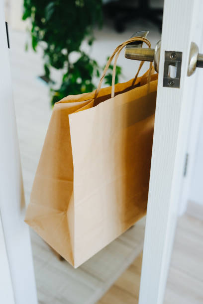 istock The craft package hangs on the handle from the front door 1221688647