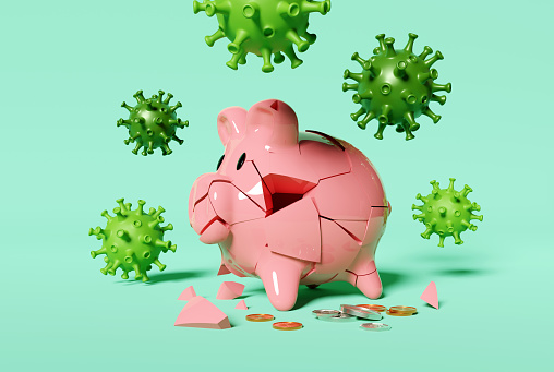 A cracked piggy bank surrounded by a virus. Covid-19 cornonavirus ruining saving plans and financial futures. 3D illustration