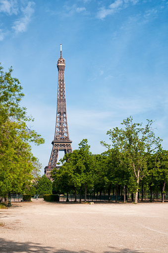 A mesmerizing scenery of the Eiffel Tower after a rainy day with no people in Paris, France