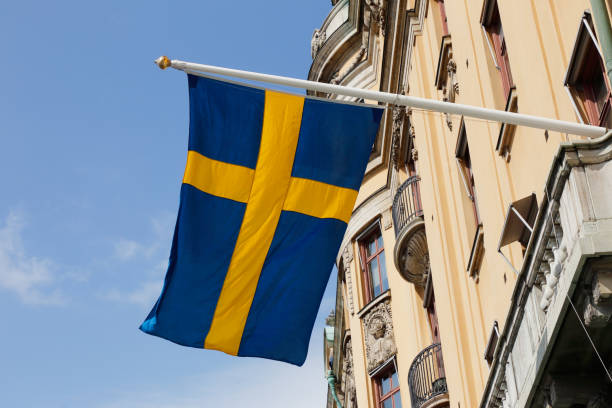шведский флаг - day sky swedish flag banner стоковые фото и изображения