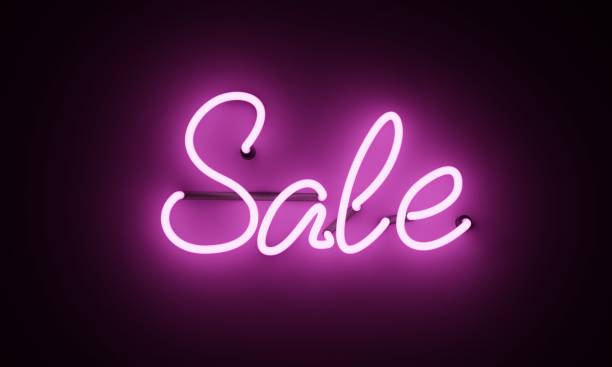 istock Neon sign, the word Sale on dark background. Discount Background for your design, greeting card, banner. 1221693784