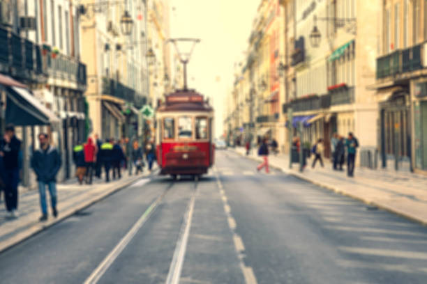 Lisbon, Portugal - April 24, 2011. Two vehicles of the Lisbon tram encountering at a turnout of a steep alley.