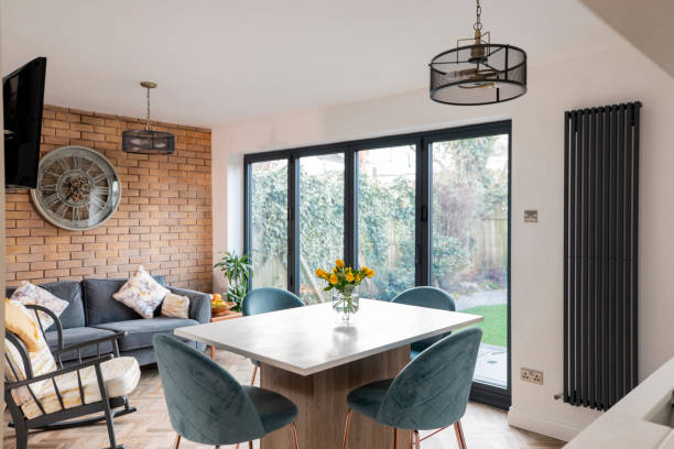 Cosy Home Interior Home interior with open plan kitchen, lounge and dining area. northeastern england photos stock pictures, royalty-free photos & images