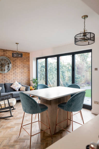Home Interior Home interior with open plan kitchen, lounge and dining area. northeastern england photos stock pictures, royalty-free photos & images