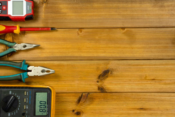 istock Electrician tool on wooden background with copy space. Top view. Flat lay 1221705921