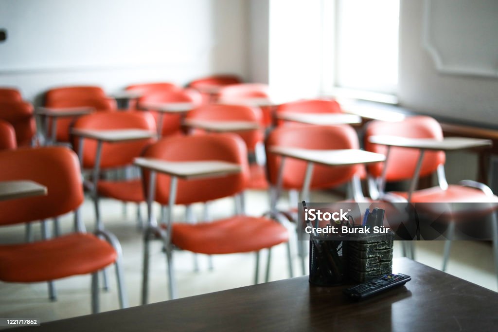 Between Empty Class and Corona Education Classroom Stock Photo
